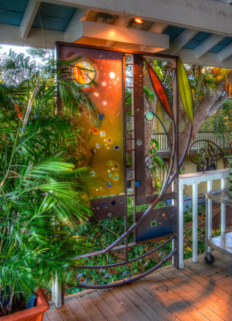 a mixed media glass and metal privacy screen.