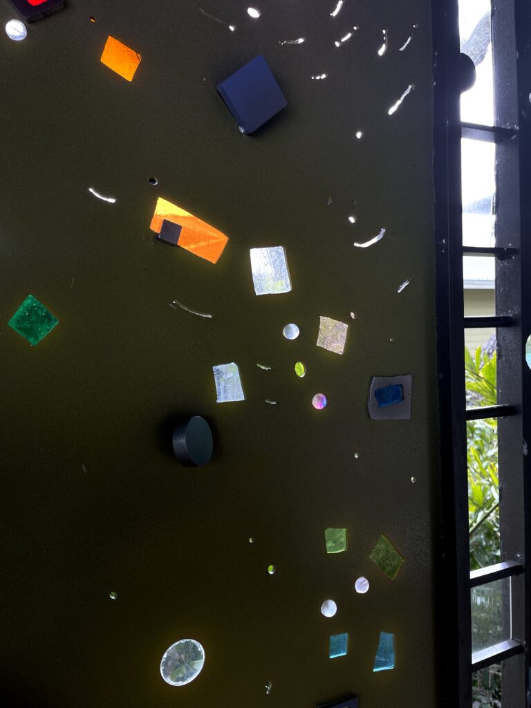 detail of glass set into metal. 